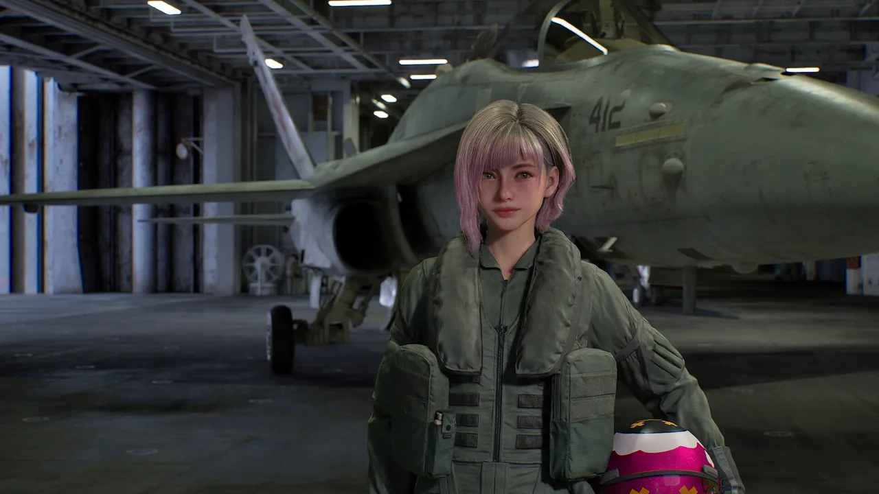 A pilot with pink hair in a green flight suit stands in a hangar in front of a grey fighter